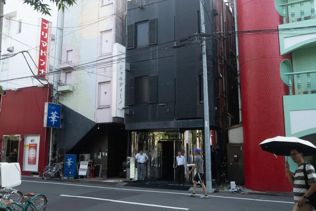 Street view with colorful buildings in Japan; urban sightseeing on Japan tours.