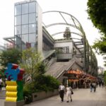 Miyashita Park in Tokyo, Japan, vibrant urban area with modern architecture and outdoor dining spots.