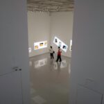 Visitors exploring a modern art gallery in Japan, highlighting contemporary culture on a Japan tour.