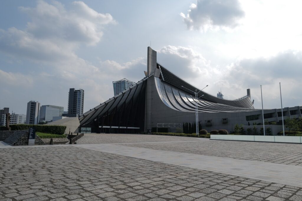 Tokyo's Yoyogi National Gymnasium, a must-see architectural marvel on your Japan tour. Discover its iconic design!