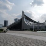Tokyo's Yoyogi National Gymnasium, a must-see architectural marvel on your Japan tour. Discover its iconic design!