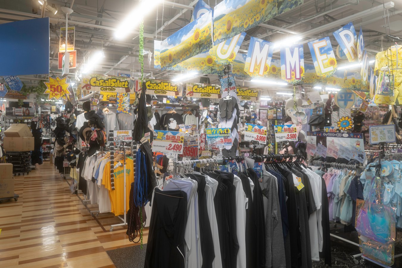 Colorful Japanese shop offering summer clothes and accessories during a tour of vibrant Japan shopping districts.