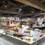 Modern Japanese store interior with shelves of local goods, perfect for travelers on Japan tours.
