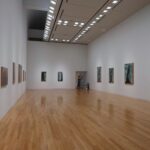 Modern art gallery in Japan with wooden flooring—explore art on Japan cultural tours.