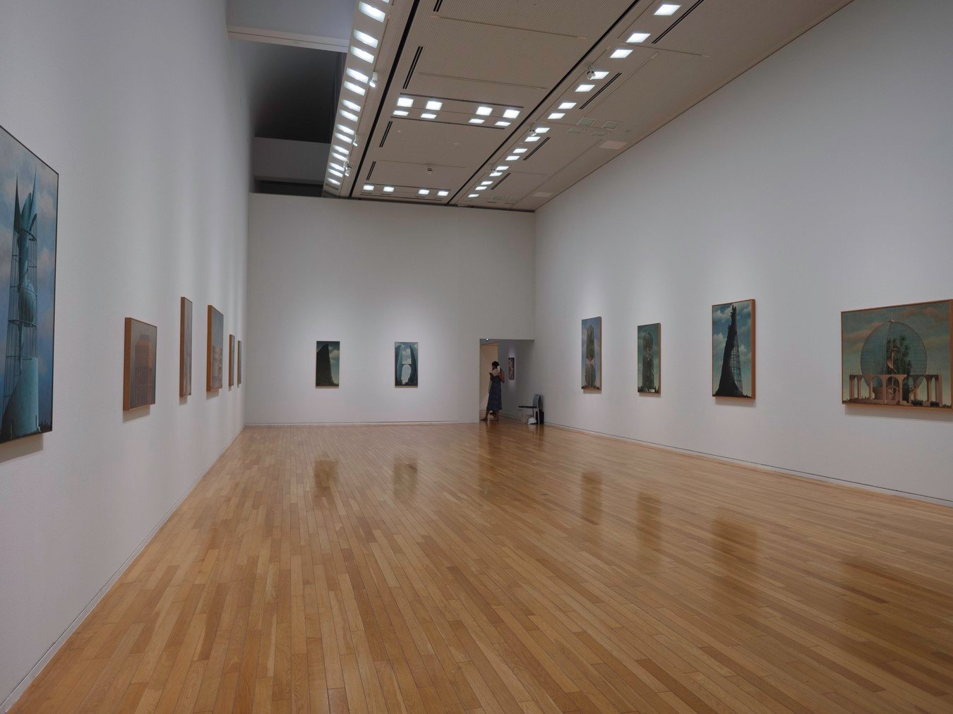 Modern art gallery in Japan with wooden flooring—explore art on Japan cultural tours.