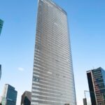 Modern skyscraper in Tokyo's skyline, a must-see on Japan tours for architecture lovers and urban explorers.